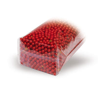Cross bottom bags with sealed seam and double-sided Christmas star print 30 microns — Detail view in a typical packaging application with content example