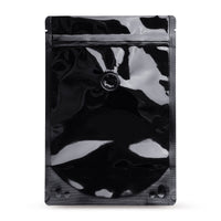 Stand-up pouch black with aroma protection valve — Main view of the bag with aroma valve, aroma protection from Elke Plastic