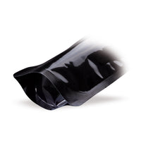 Stand-up pouch black with aroma protection valve — Material close-up focusing on film thickness and finishing quality